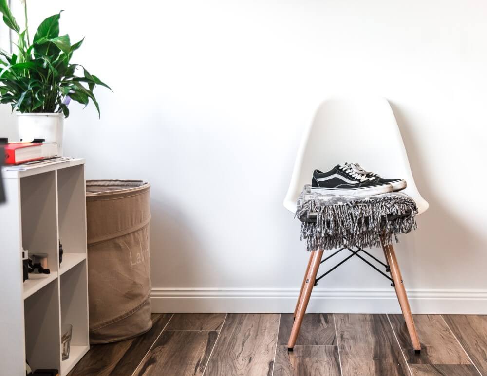 wide wooden floor and chair